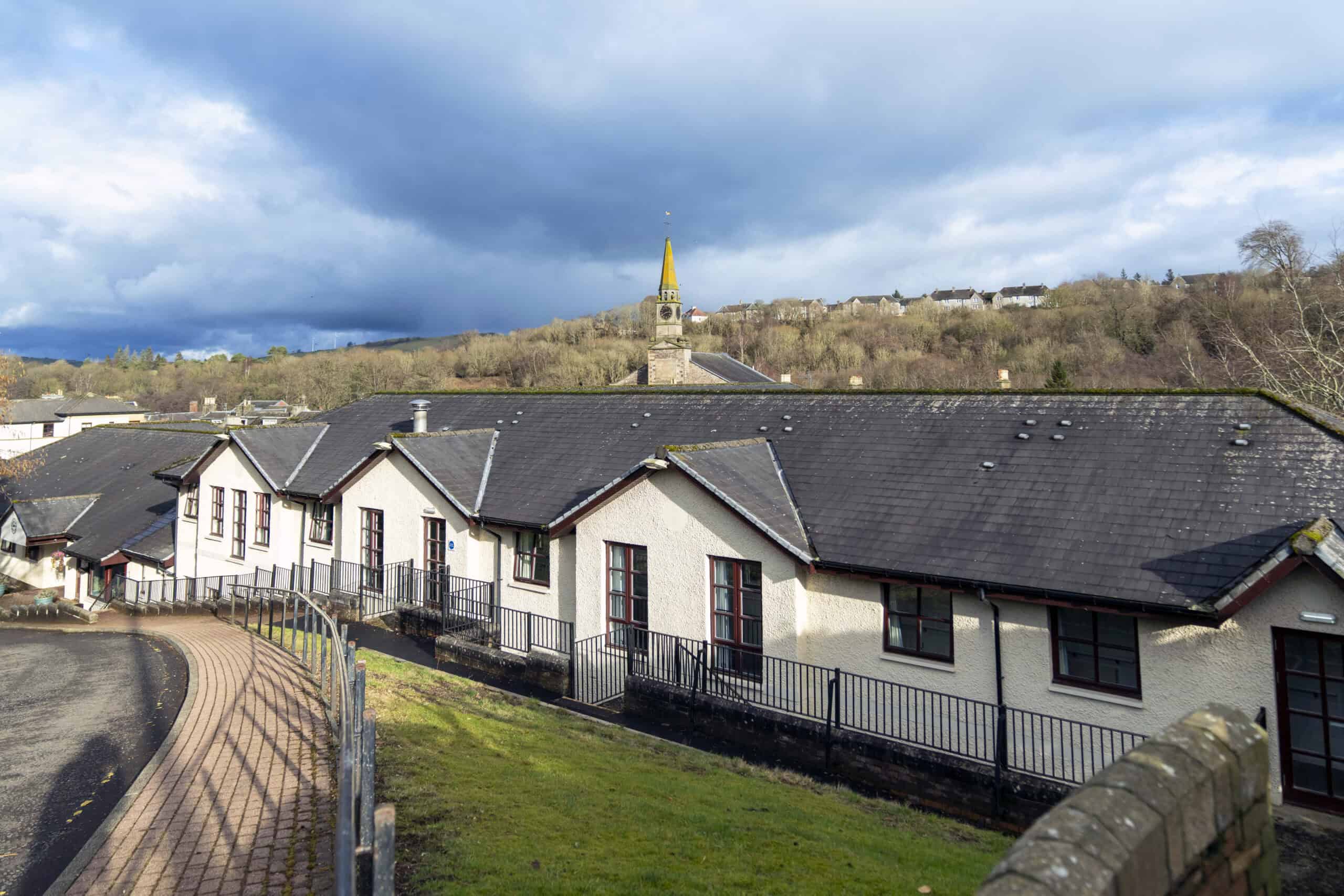 Modern housing units with scenic hillside views in Argyll.